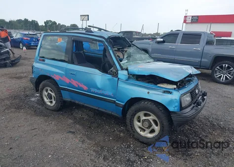 1994 Geo Tracker from USA, damaged, VIN 2CNBJ18U5R6945044